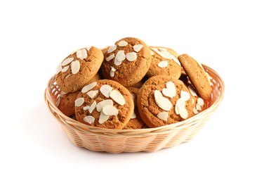 Photo of Tasty cookies with almond flakes in wicker basket isolated on white