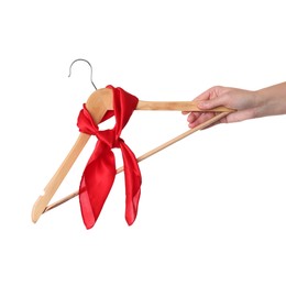 Photo of Woman holding hanger with red handkerchief on white background, closeup