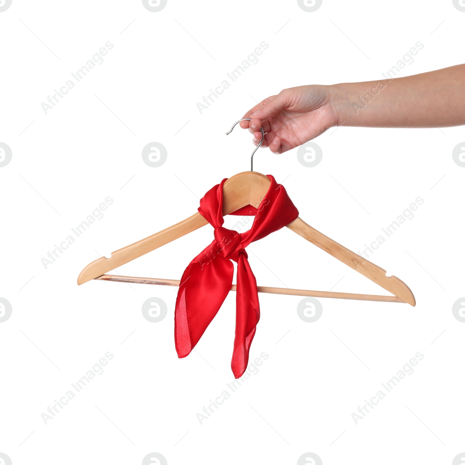 Photo of Woman holding hanger with red handkerchief on white background, closeup