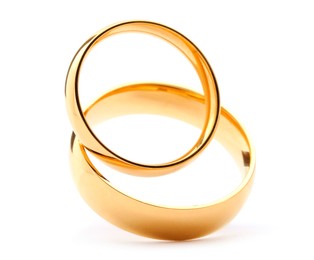 Beautiful golden wedding rings isolated on white