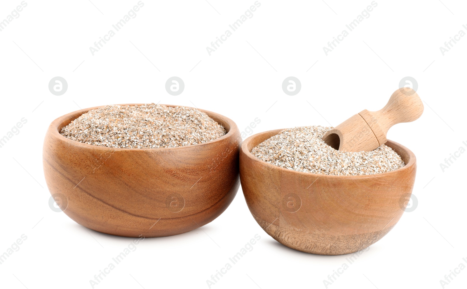 Photo of Rye bran in bowls isolated on white