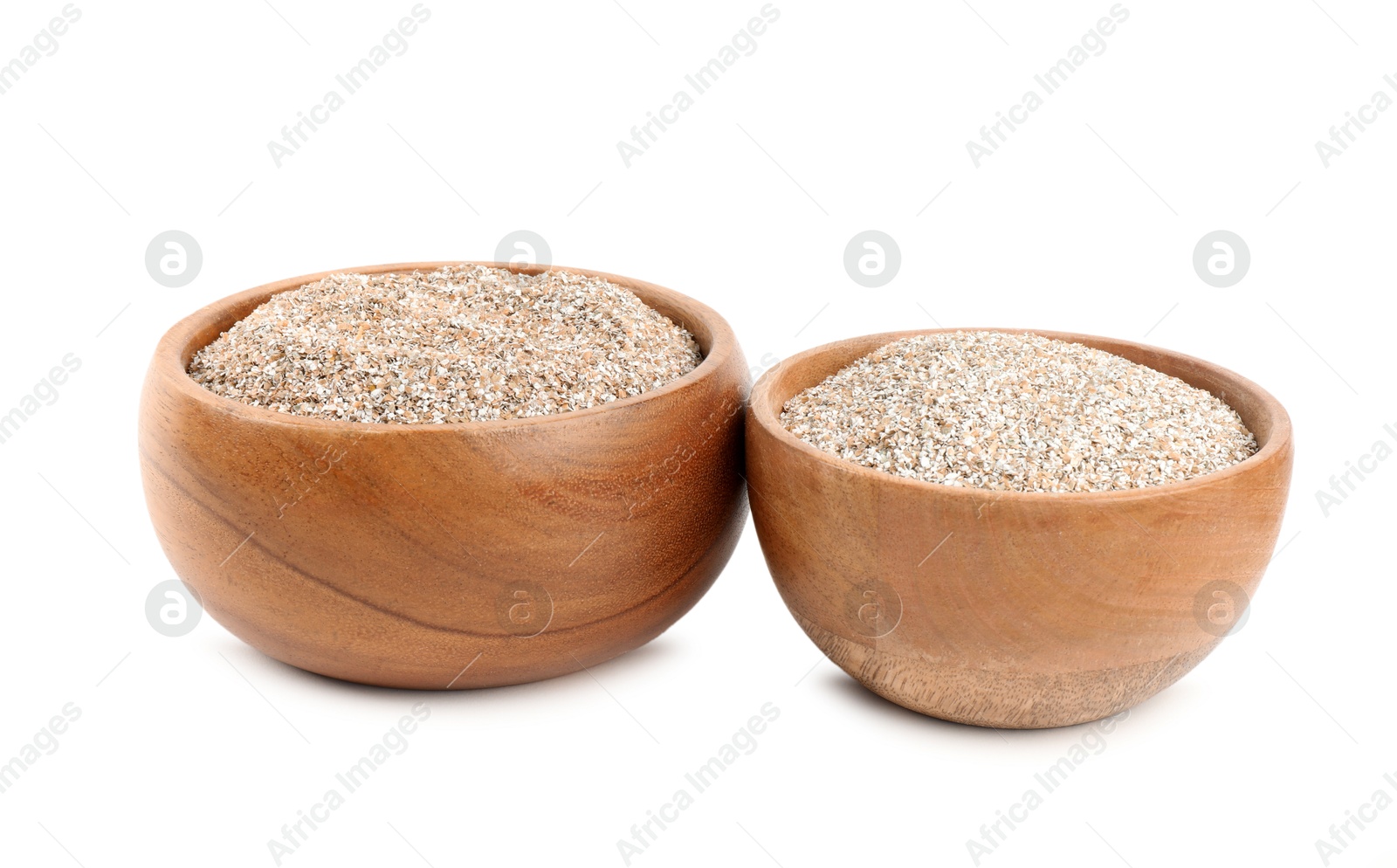 Photo of Rye bran in bowls isolated on white