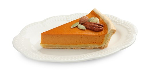 Photo of Piece of tasty homemade pumpkin pie with seeds and nuts isolated on white