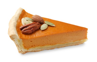 Photo of Piece of tasty homemade pumpkin pie with seeds and nuts isolated on white