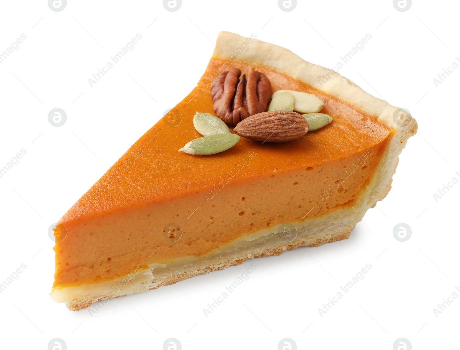 Photo of Piece of tasty homemade pumpkin pie with seeds and nuts isolated on white