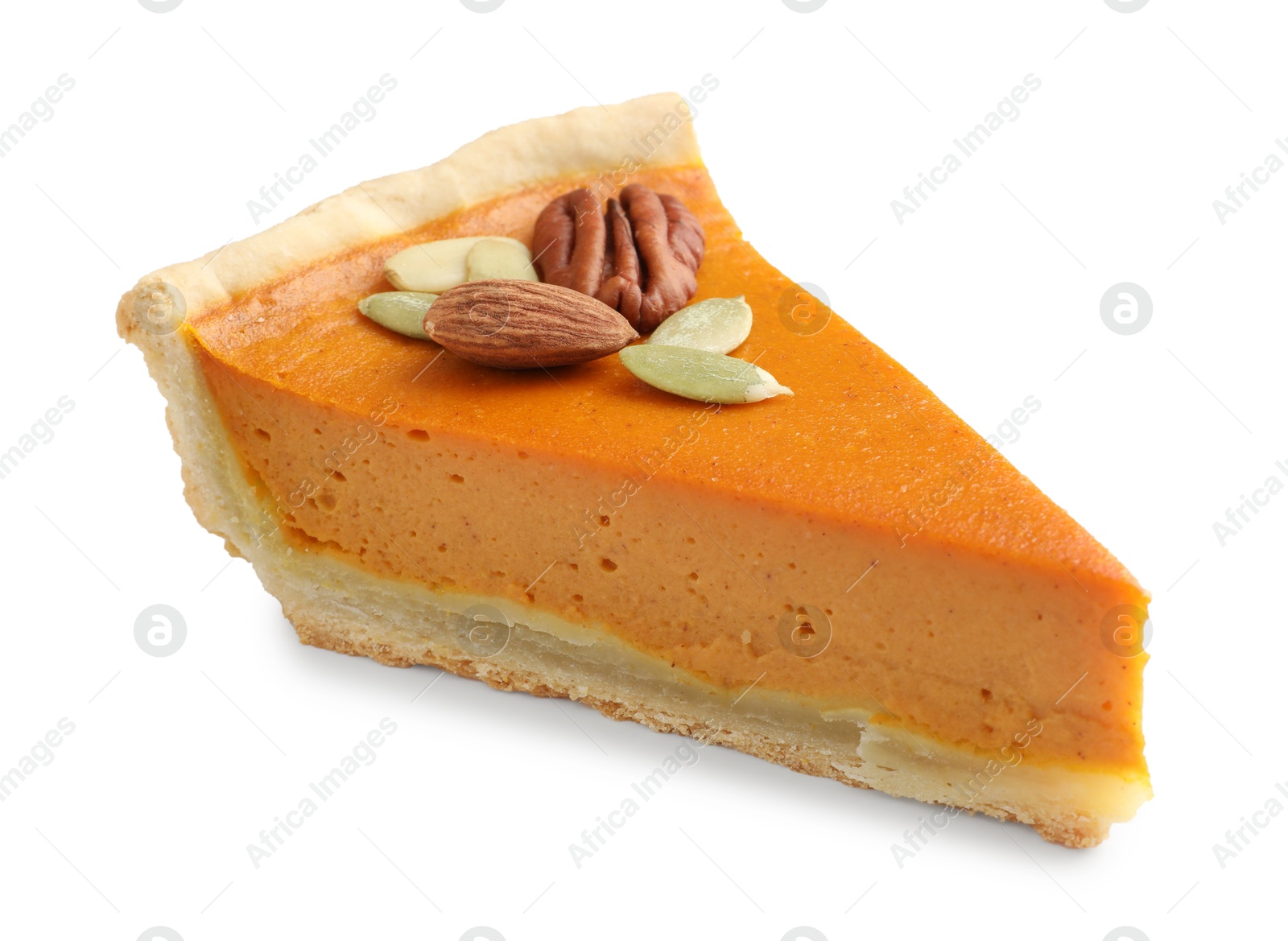 Photo of Piece of tasty homemade pumpkin pie with seeds and nuts isolated on white