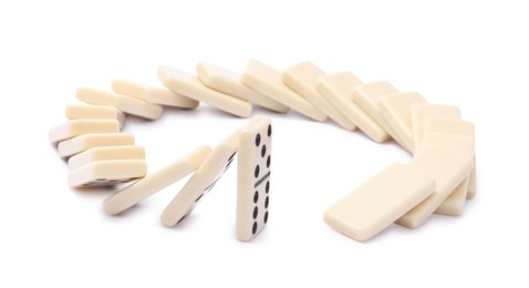 Domino effect. Tiles falling on white background