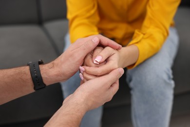 Photo of Professional psychologist working with patient in office, closeup