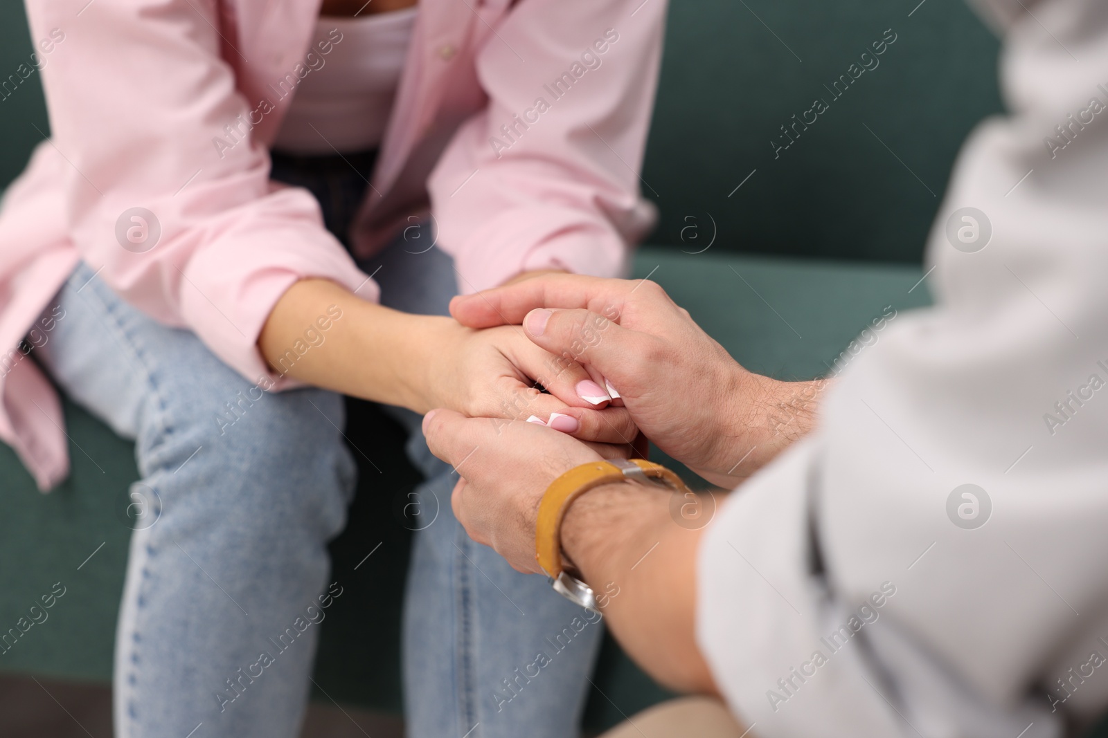 Photo of Professional psychologist working with patient in office, closeup