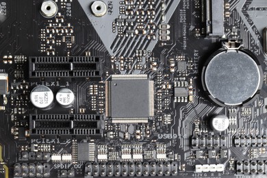 Photo of Computer motherboard as background, top view. Electronic engineering