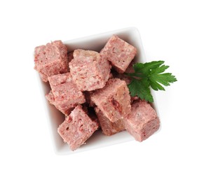 Photo of Canned meat with fresh parsley in bowl isolated on white, top view