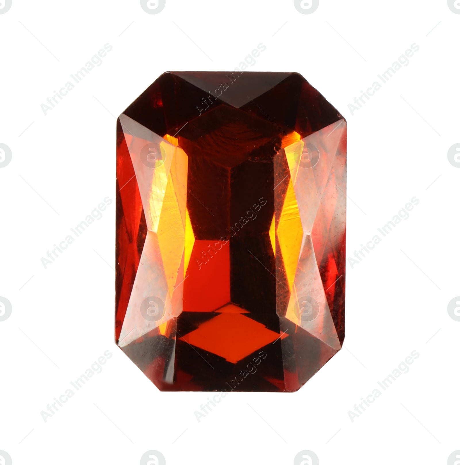 Photo of One shiny red gemstone isolated on white, top view