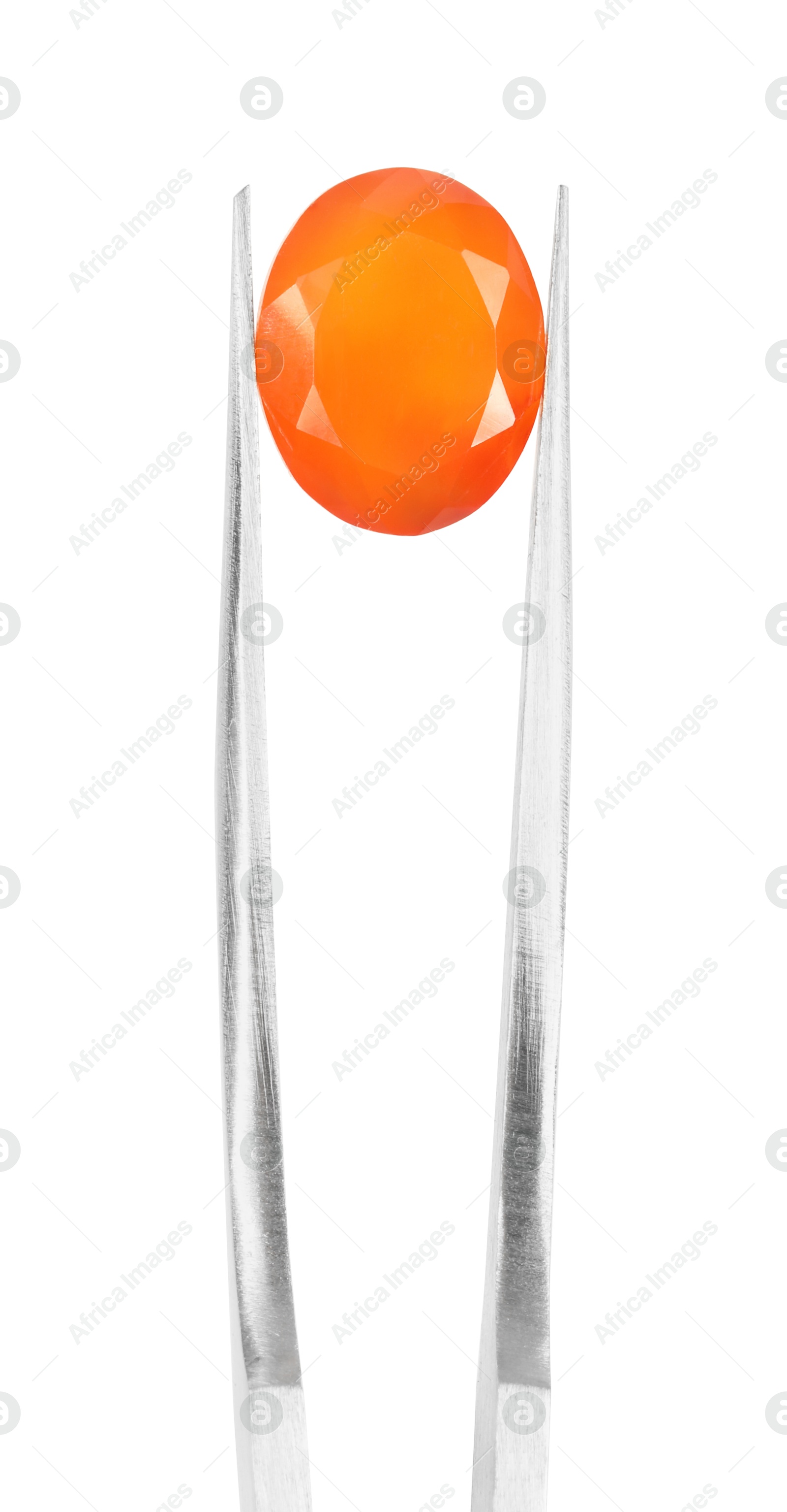 Photo of Tweezers with shiny orange gemstone isolated on white