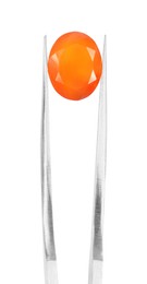 Photo of Tweezers with shiny orange gemstone isolated on white