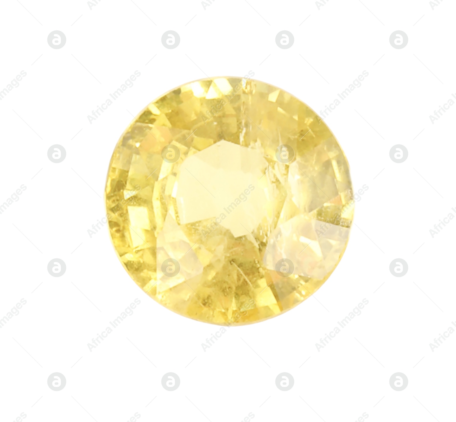 Photo of One shiny yellow gemstone isolated on white, top view