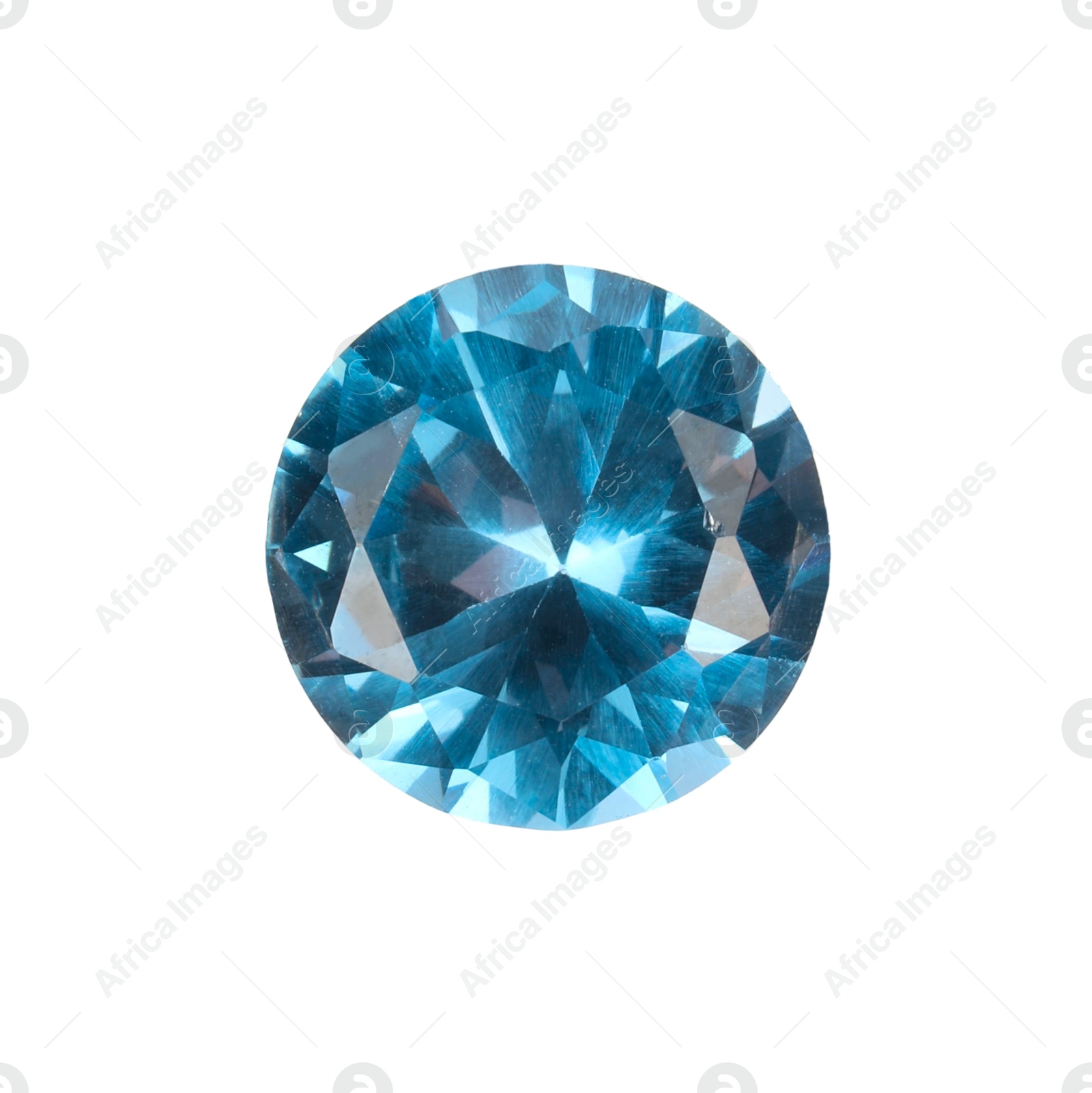 Photo of One shiny light blue gemstone isolated on white, top view