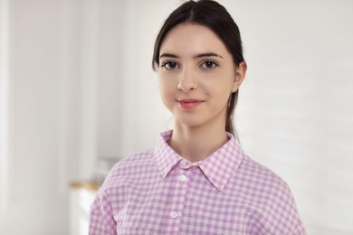 Photo of Portrait of beautiful teenage girl at home