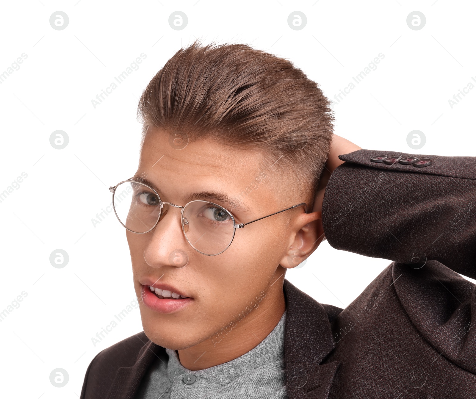 Photo of Handsome young man with stylish haircut on white background