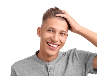 Photo of Smiling young man with stylish haircut on white background