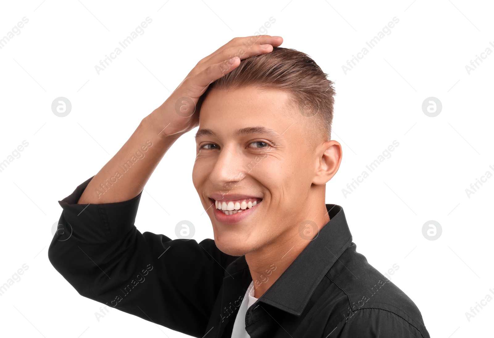 Photo of Smiling young man with stylish haircut on white background