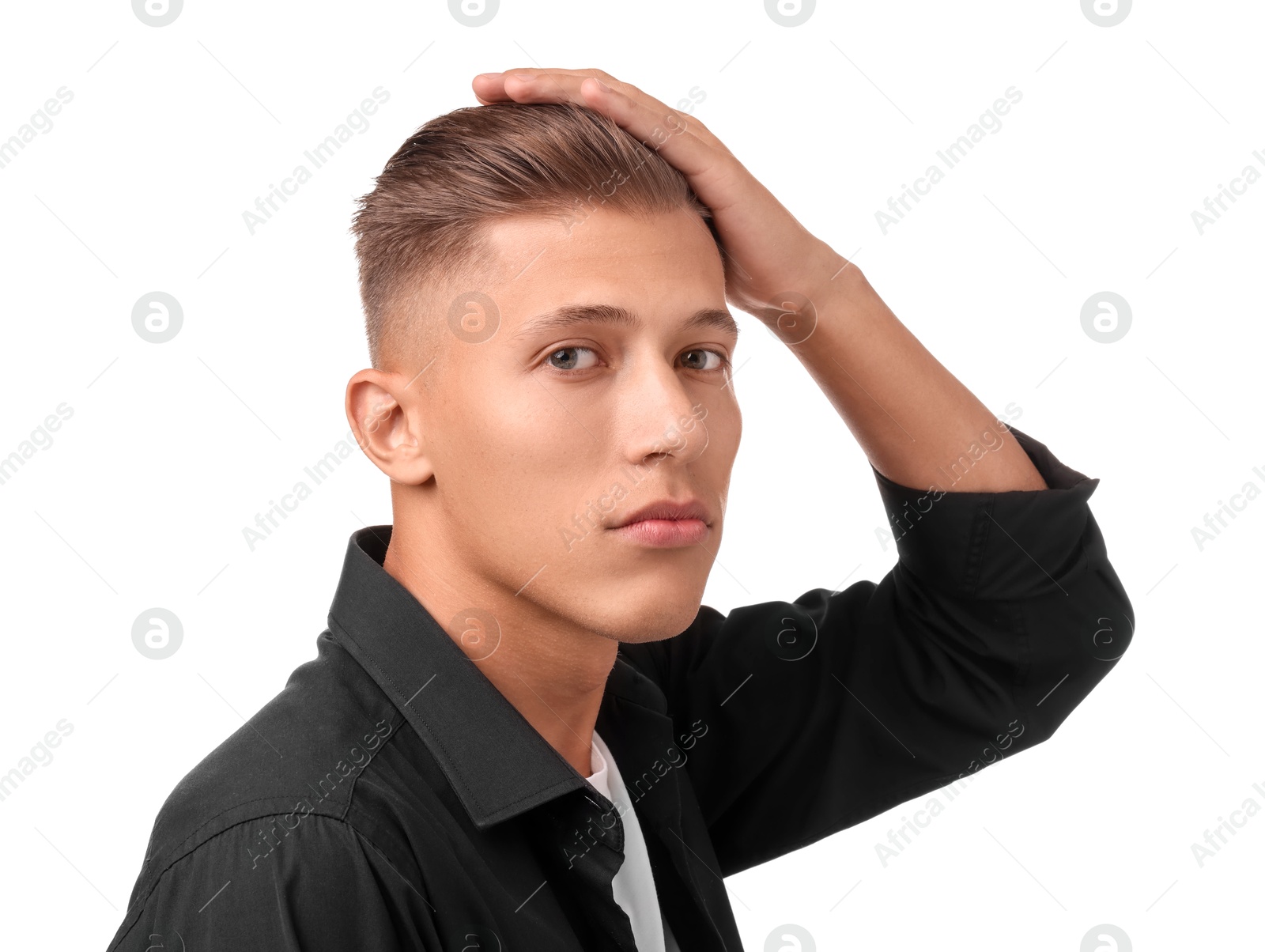 Photo of Confident young man with stylish haircut on white background