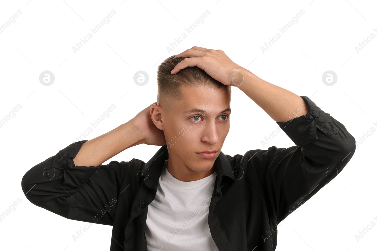 Photo of Confident young man with stylish haircut on white background