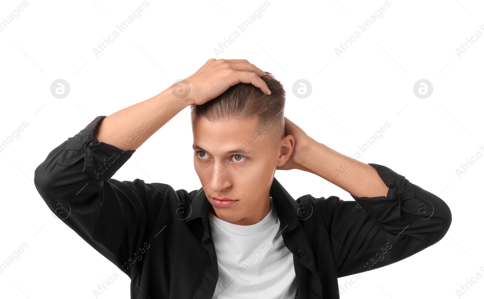 Photo of Confident young man with stylish haircut on white background