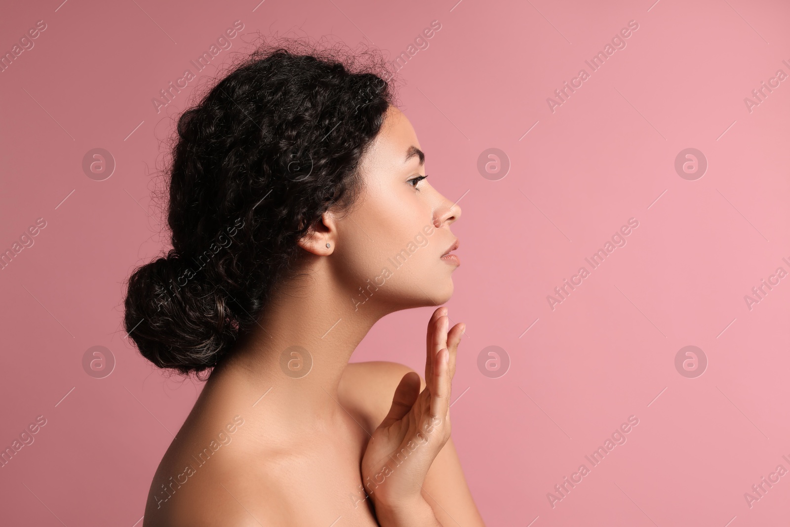 Photo of Cosmetology. Beautiful woman with perfect skin on pink background, space for text