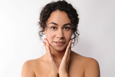 Photo of Cosmetology. Beautiful woman with perfect skin on white background