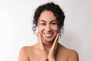 Cosmetology. Beautiful woman with perfect skin on white background