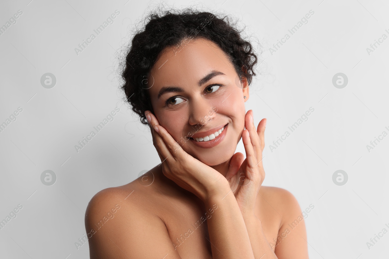 Photo of Cosmetology. Beautiful woman with perfect skin on white background