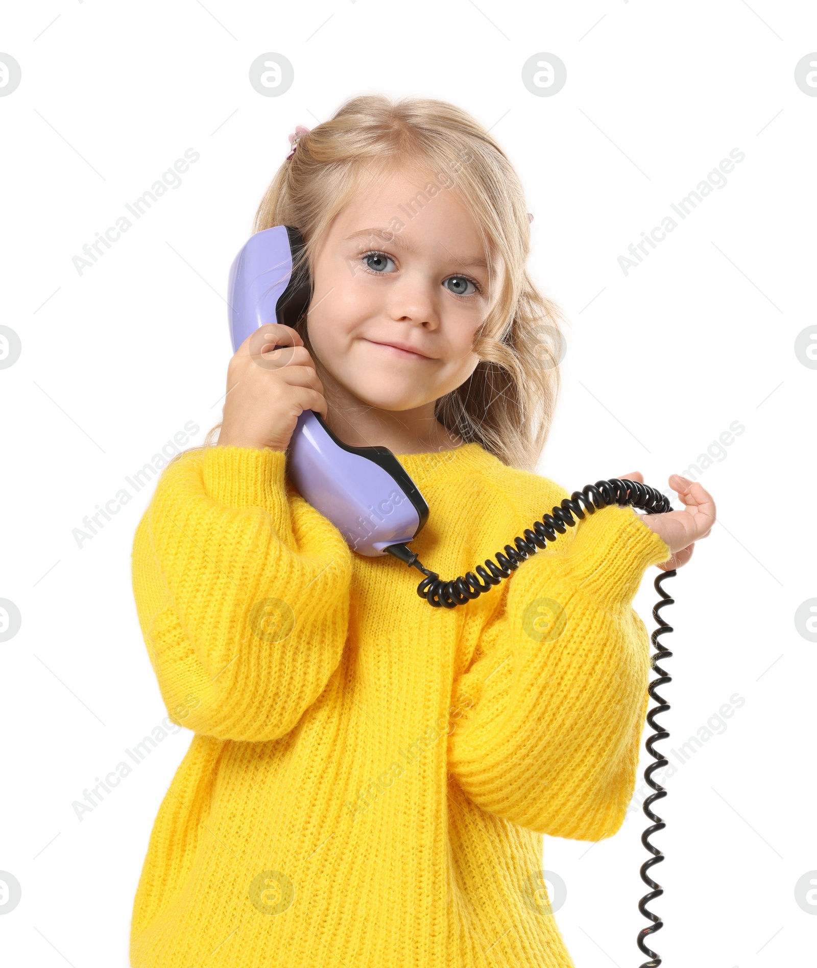 Photo of Cute little girl with handset of telephone on white background