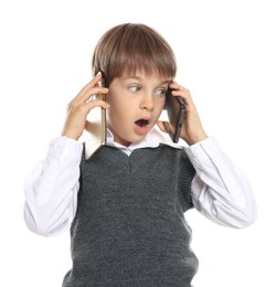 Little boy with smartphones on white background