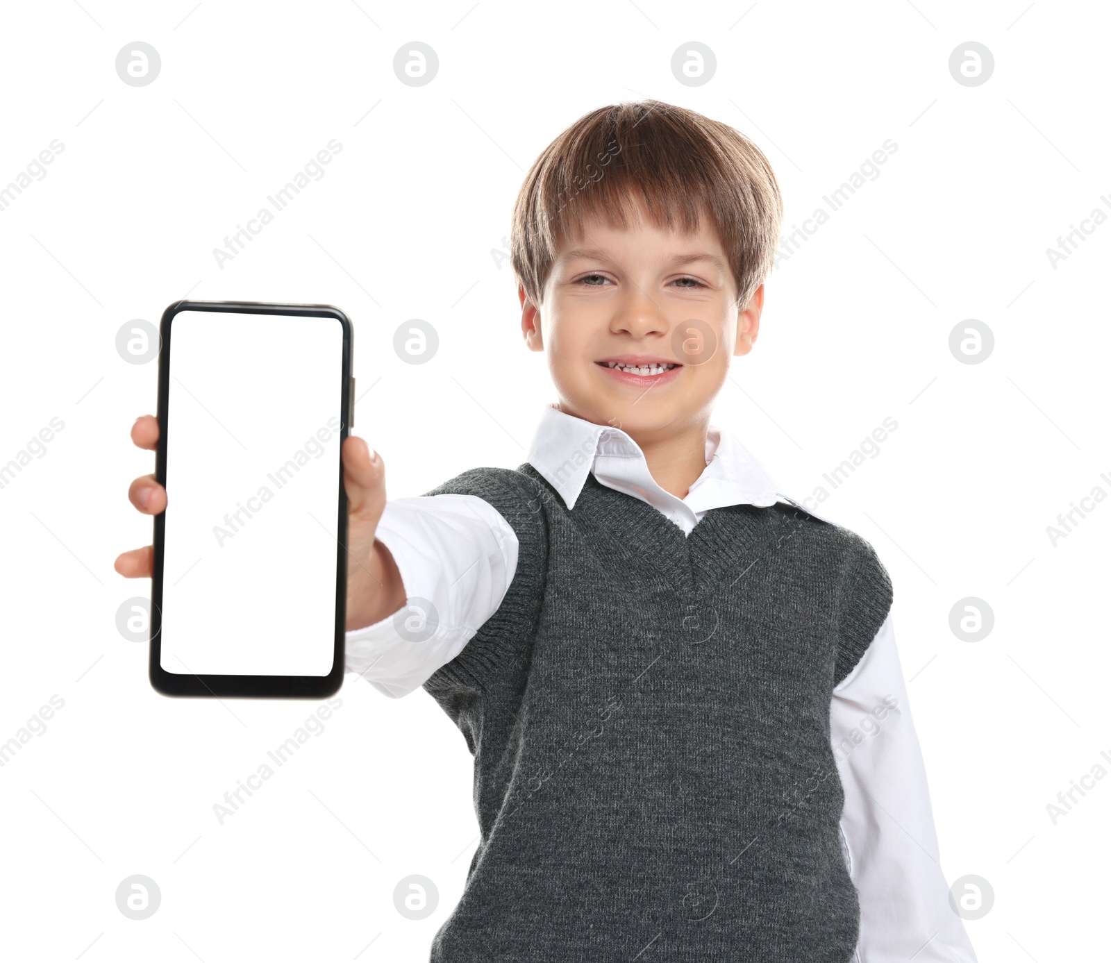 Photo of Little boy with smartphone on white background