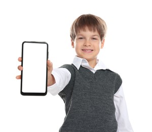 Little boy with smartphone on white background