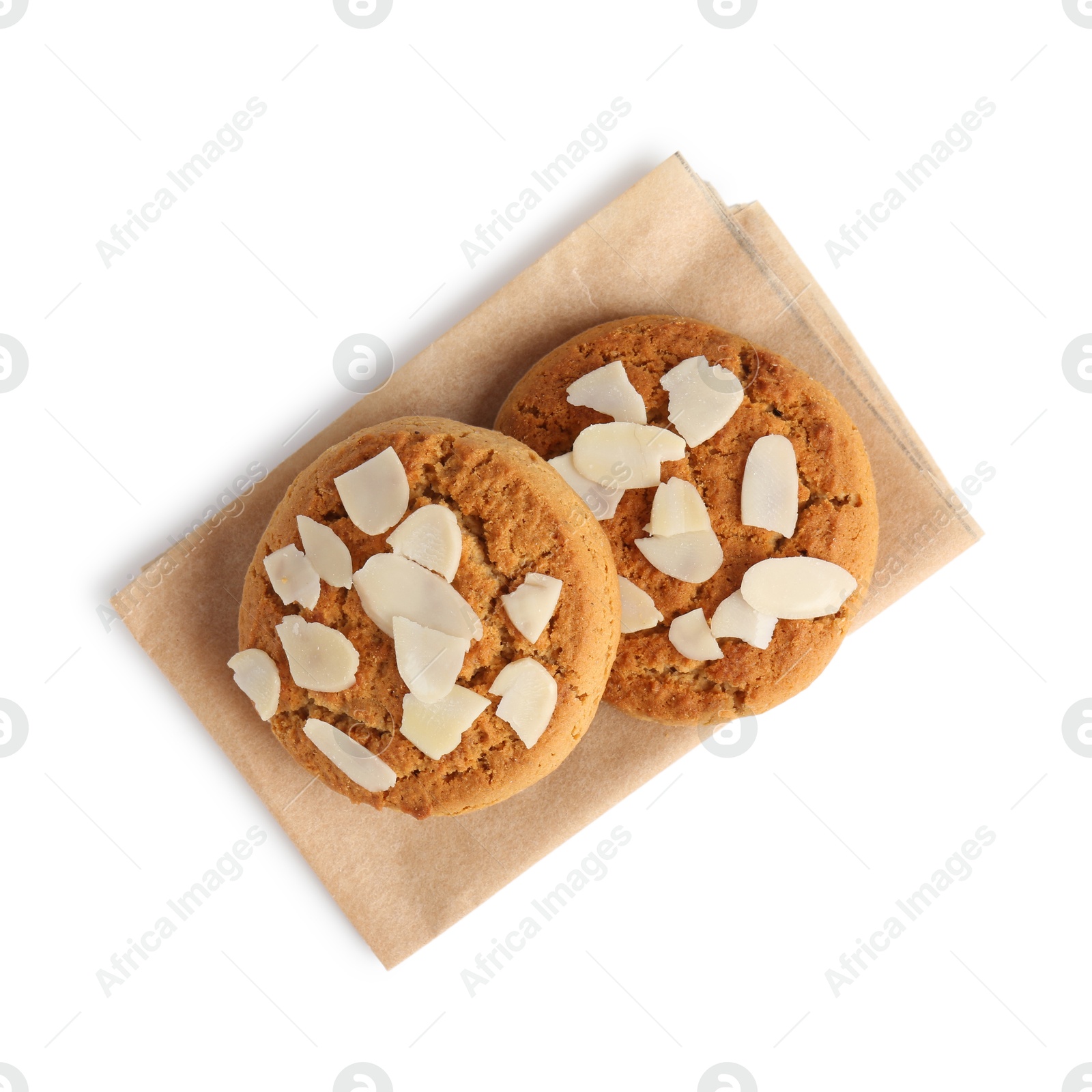 Photo of Tasty cookies with almond flakes isolated on white, top view