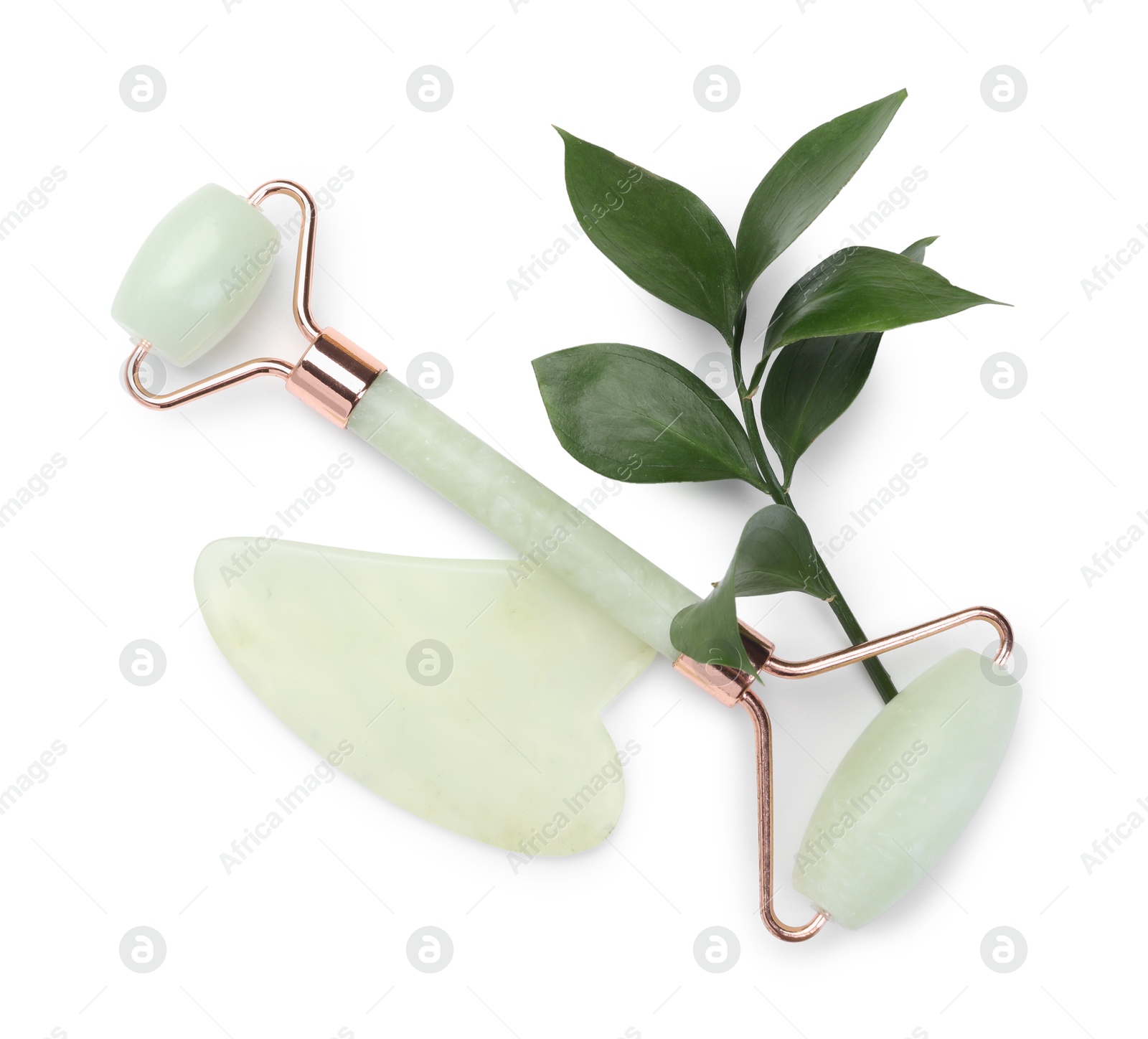 Photo of Face roller and gua sha tool isolated on white, top view