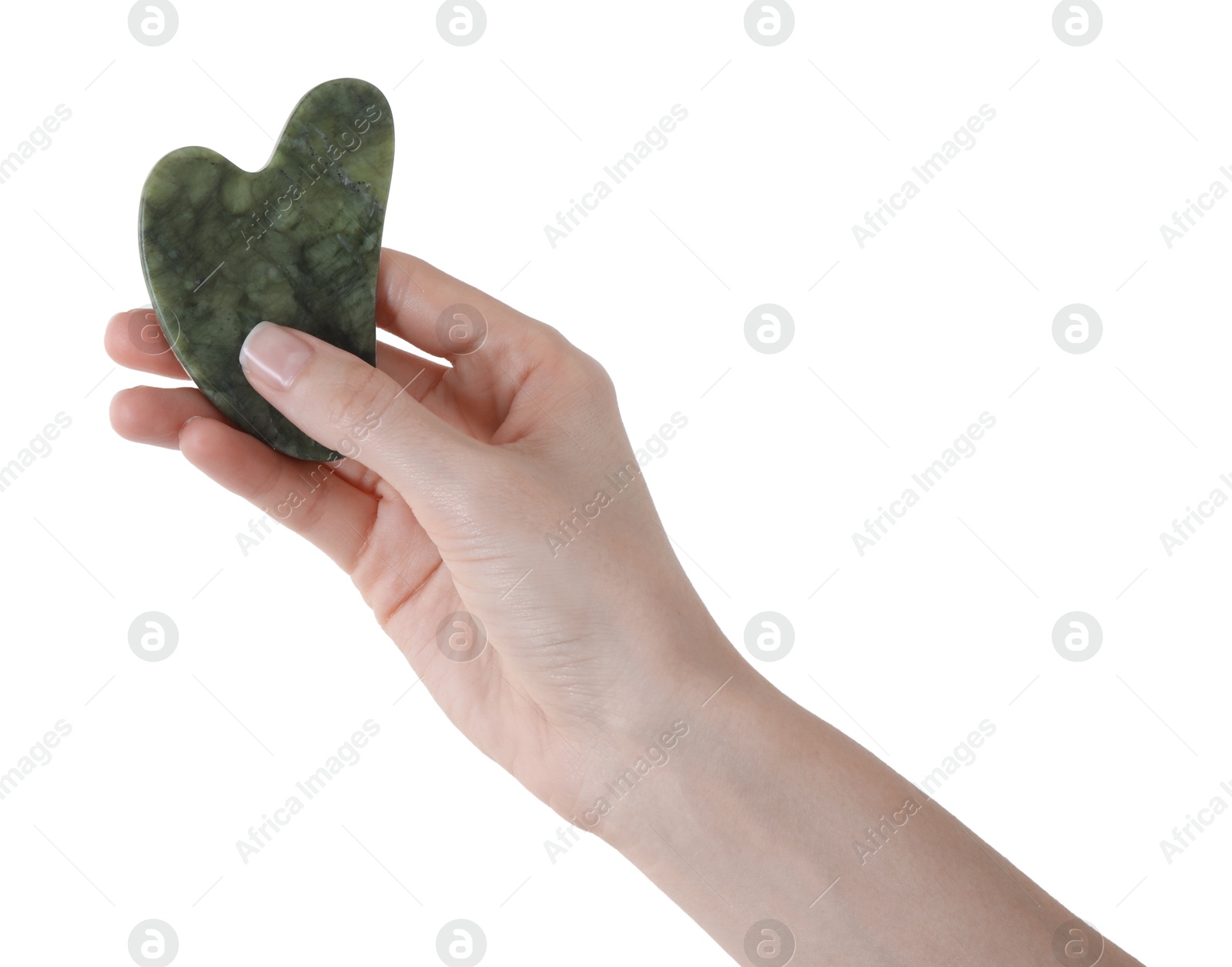 Photo of Woman holding gua sha tool on white background, closeup