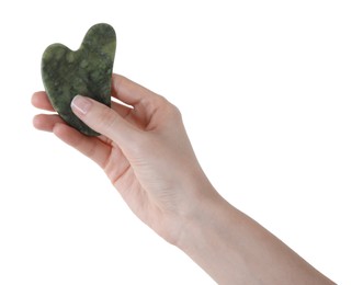 Photo of Woman holding gua sha tool on white background, closeup