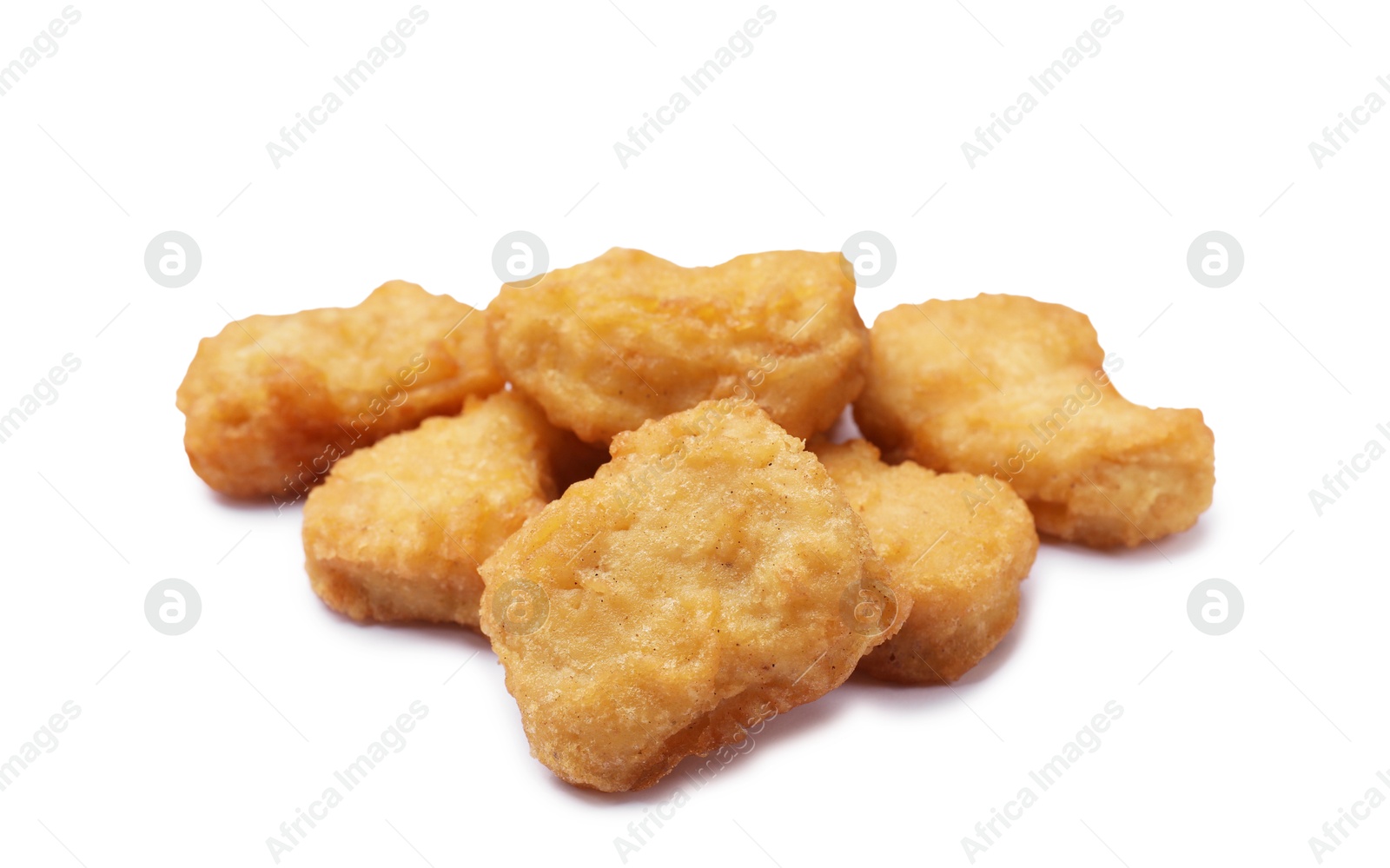 Photo of Delicious fresh chicken nuggets isolated on white