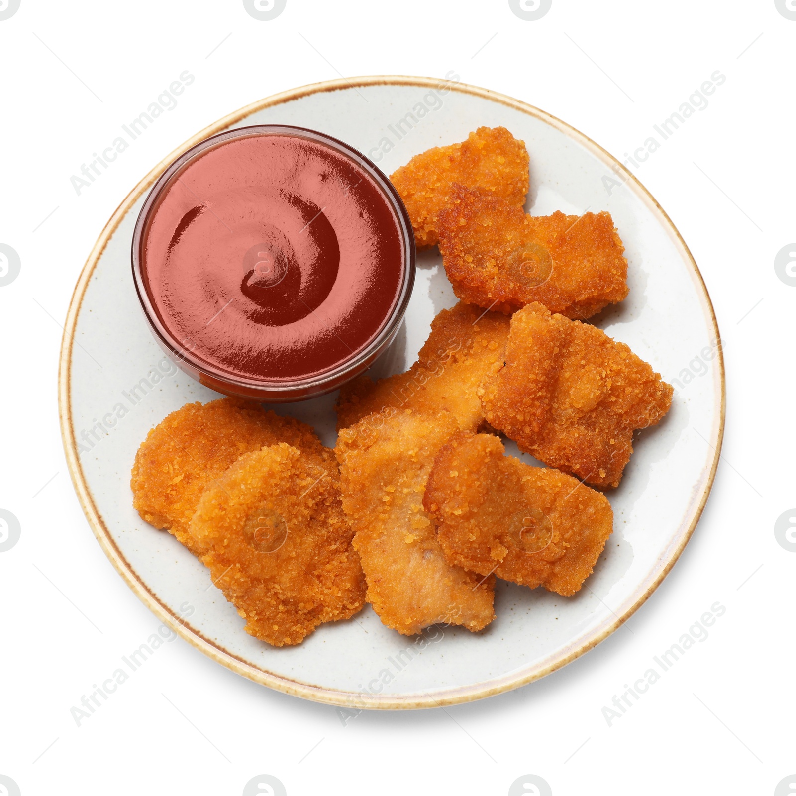 Photo of Delicious chicken nuggets with ketchup isolated on white, top view