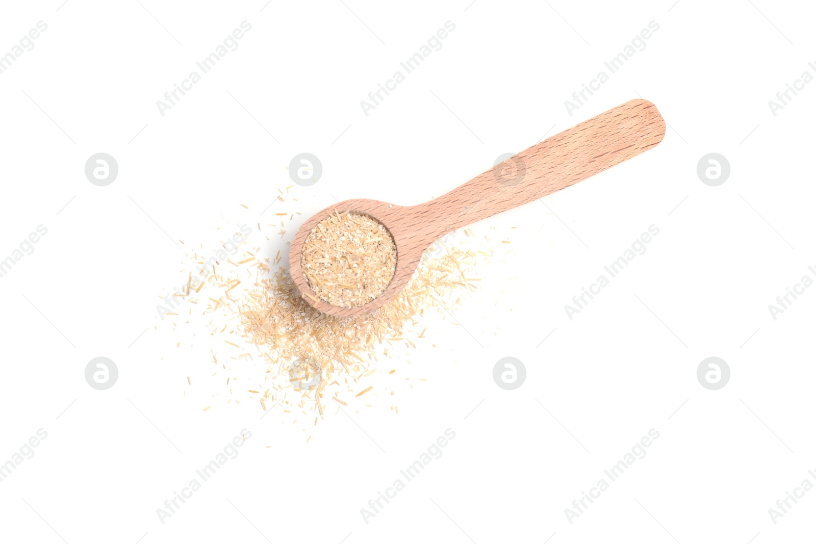 Photo of Oat bran in spoon isolated on white, top view