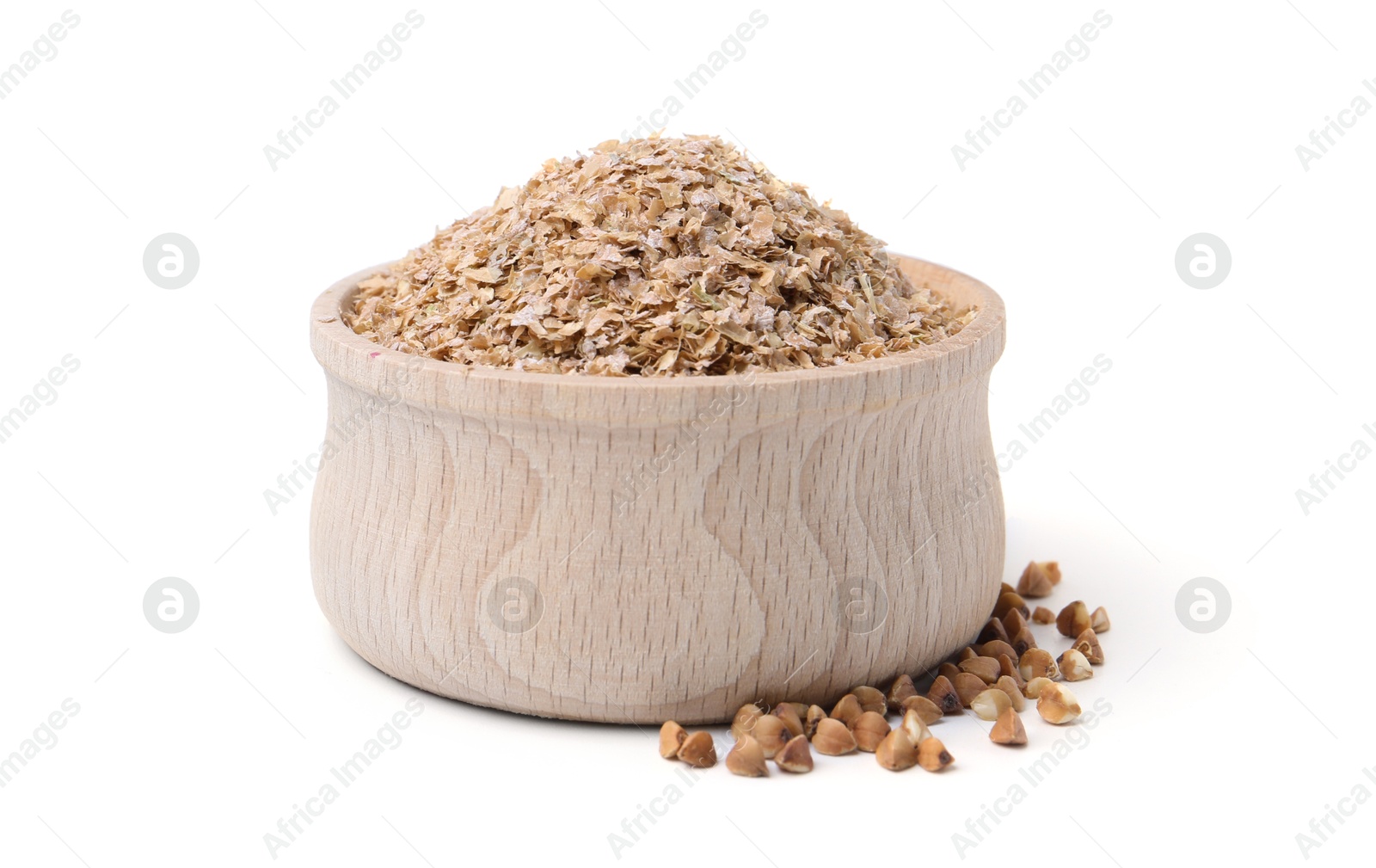 Photo of Buckwheat bran in wooden bowl and grains isolated on white