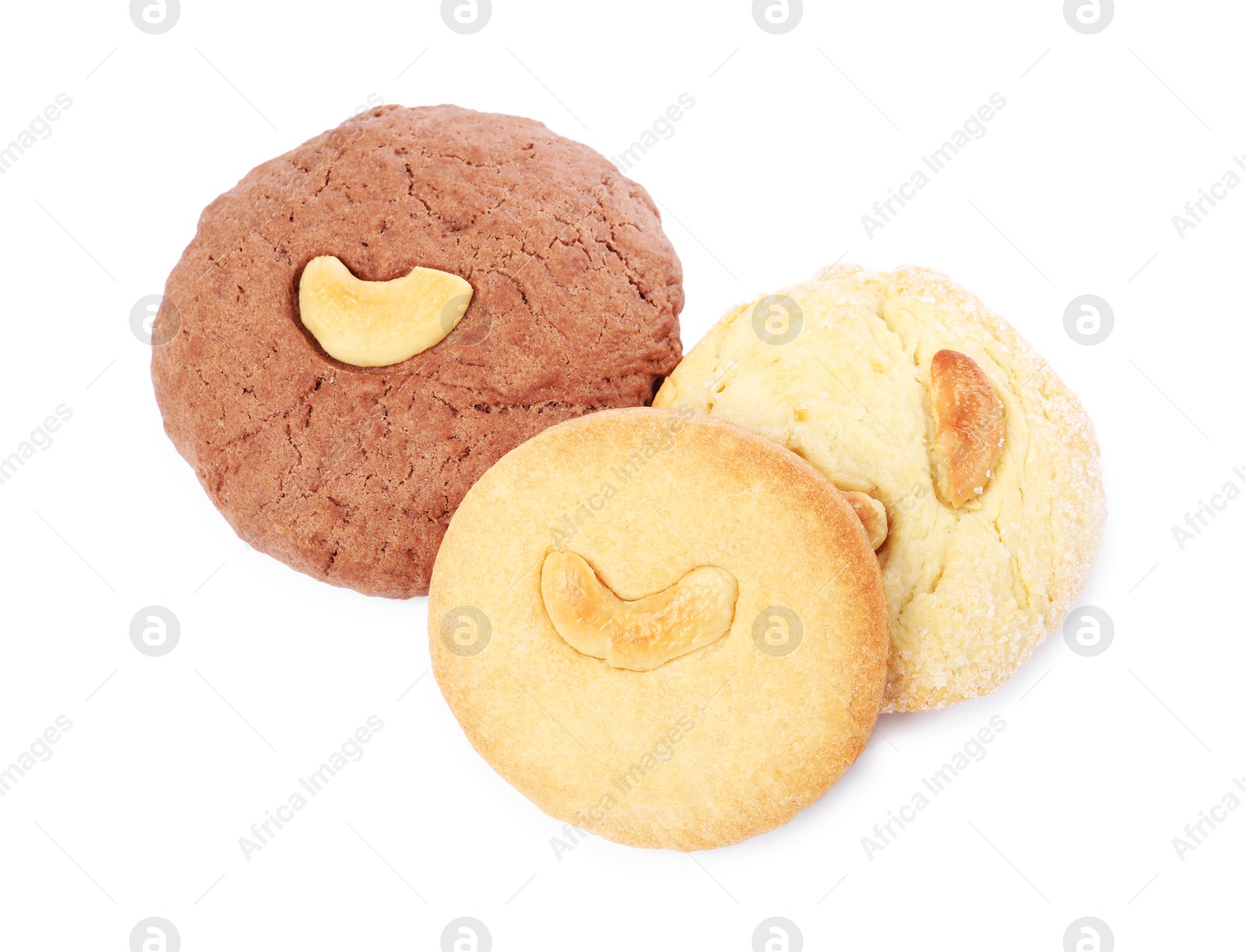 Photo of Different tasty cashew cookies isolated on white, above view