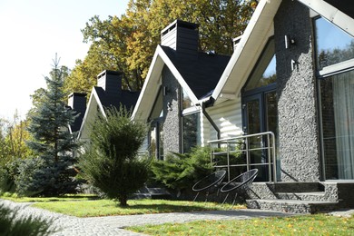 Modern hotel buildings and different plants outdoors