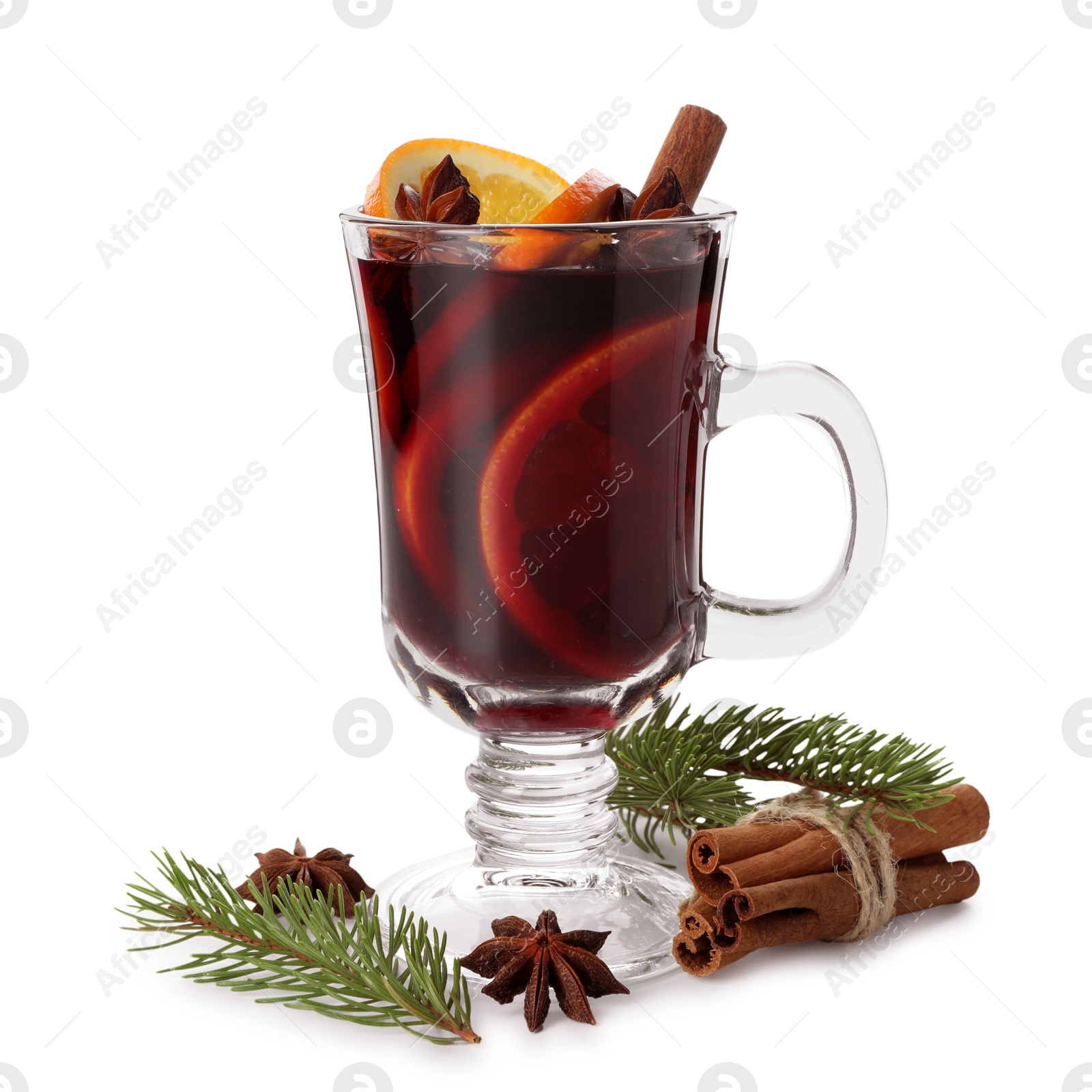 Photo of Tasty mulled wine, spices, orange slices and fir branches isolated on white. Christmas drink