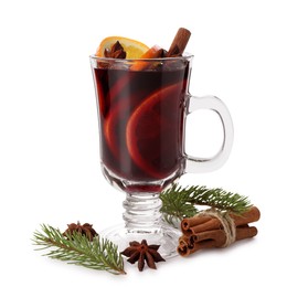 Photo of Tasty mulled wine, spices, orange slices and fir branches isolated on white. Christmas drink