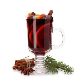 Photo of Tasty mulled wine, spices, orange slices and fir branches isolated on white. Christmas drink