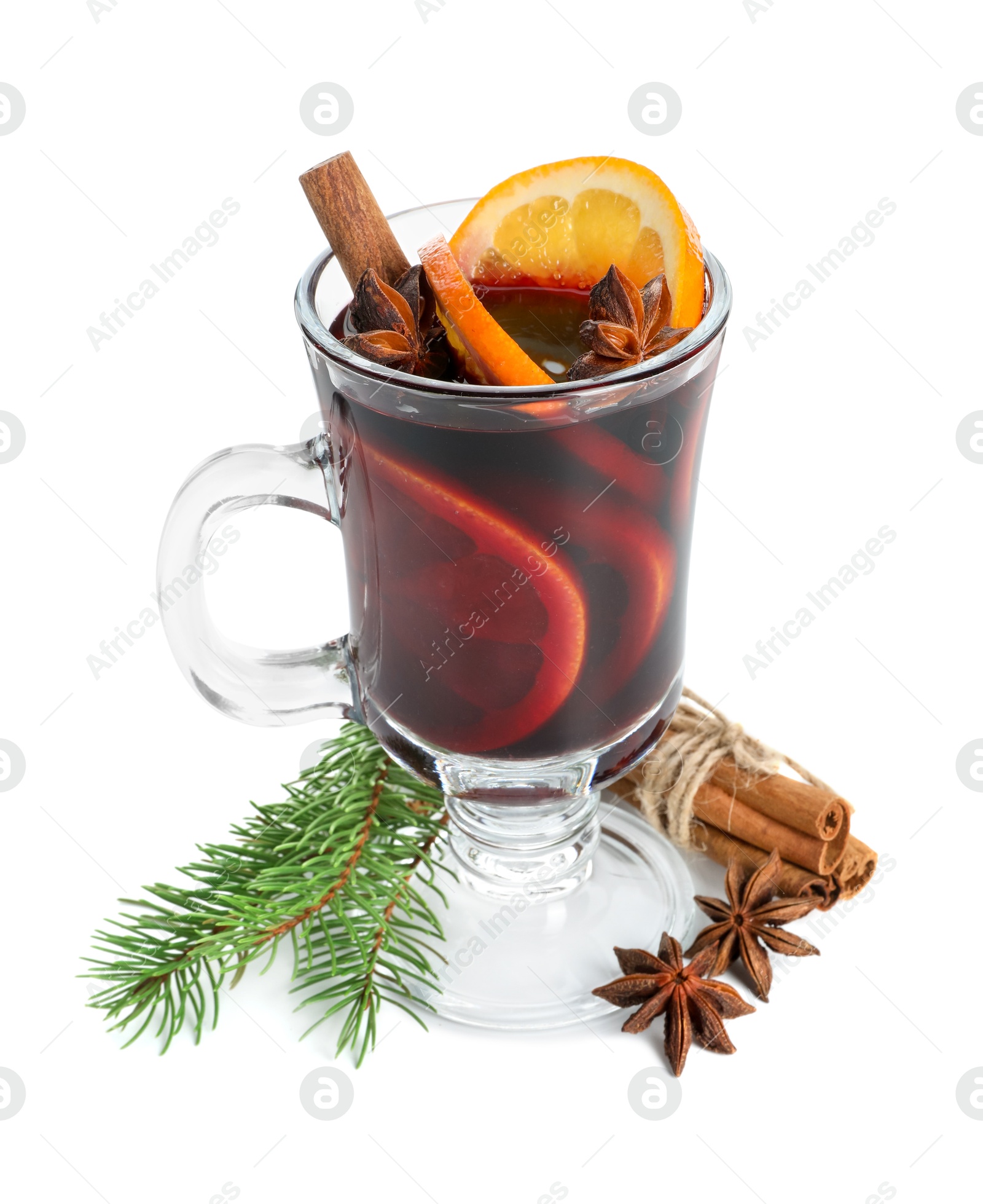 Photo of Tasty mulled wine, spices, orange slices and fir branches isolated on white. Christmas drink