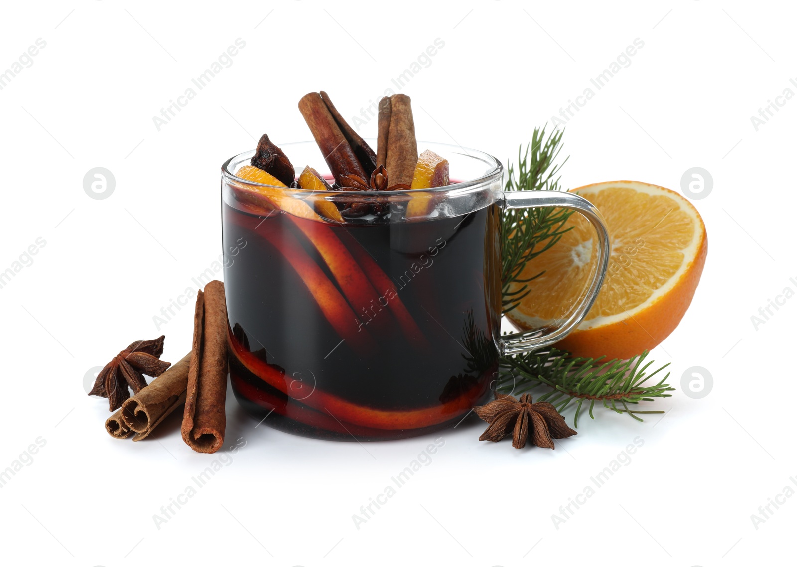 Photo of Tasty mulled wine, spices, orange and fir branches isolated on white. Christmas drink